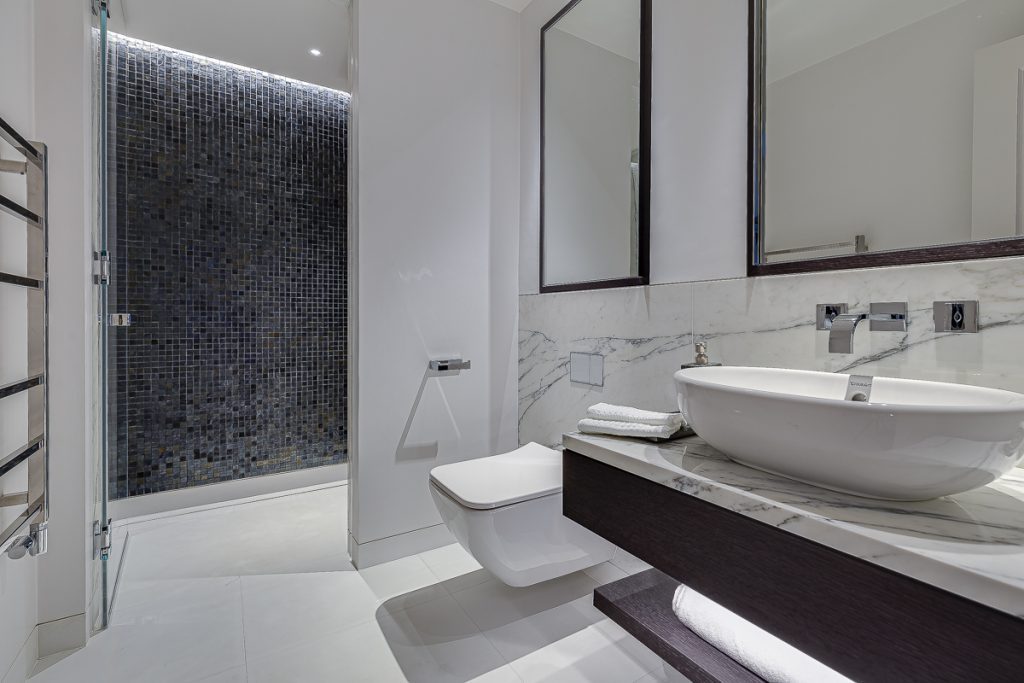 A Taj Mahal quartzite bathroom, chosen for its warmth — Cornwall Terrace, Roma Marble