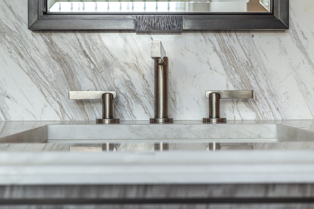 Volakas marble runs across the vanity, splashbacks and shower enclosure of a second bathroom — Cornwall Terrace, Roma Marble