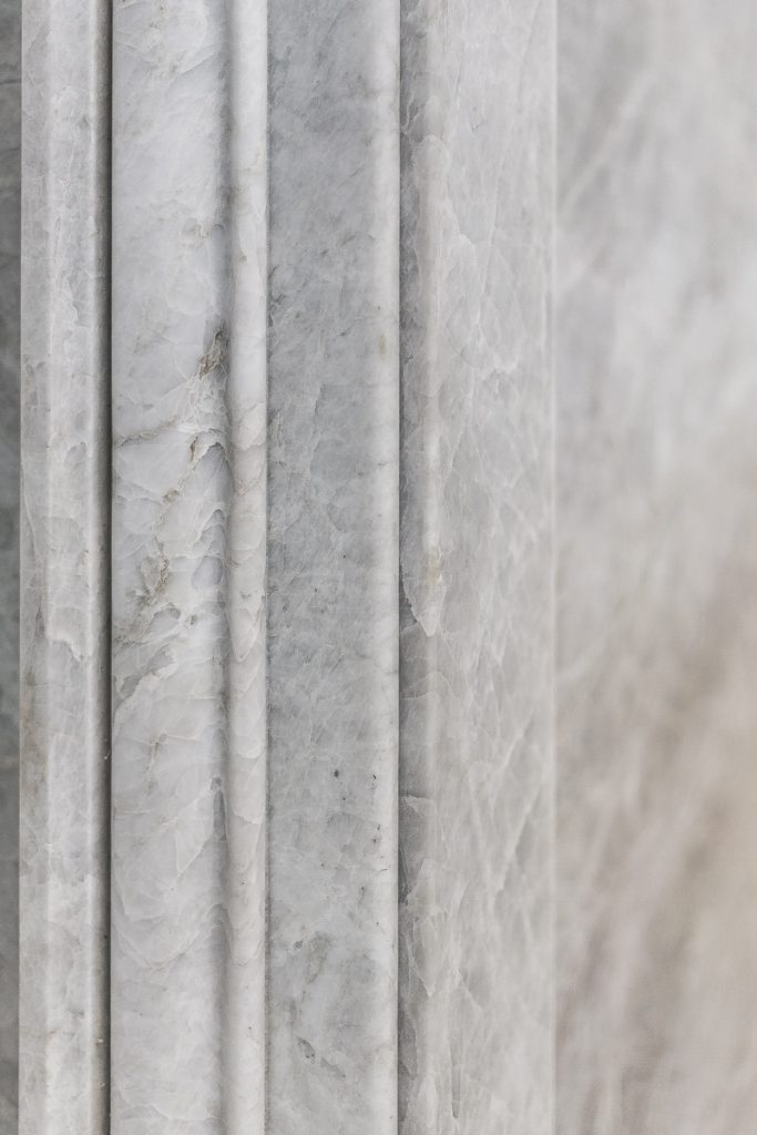 Taj Mahal quartzite architraves with bespoke edge profiles throughout — Chapel Street, Roma Marble