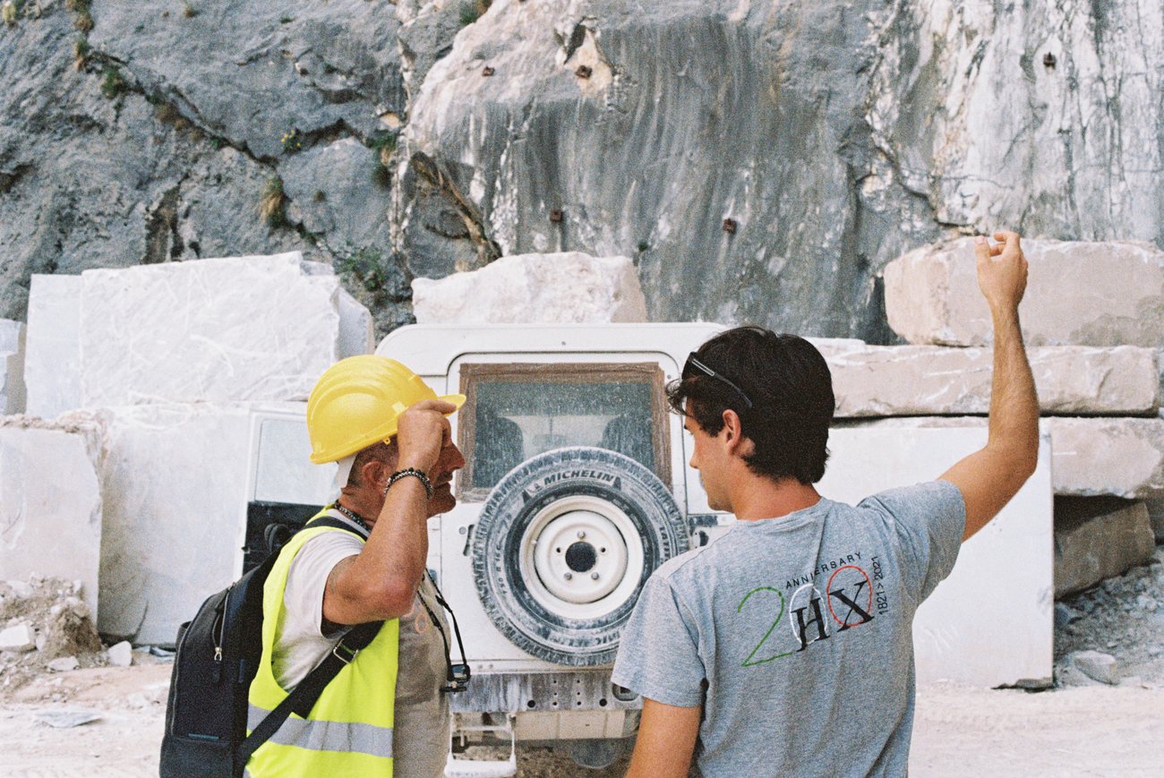 Roma Marble at the quarry face, selecting marble blocks in Italy
