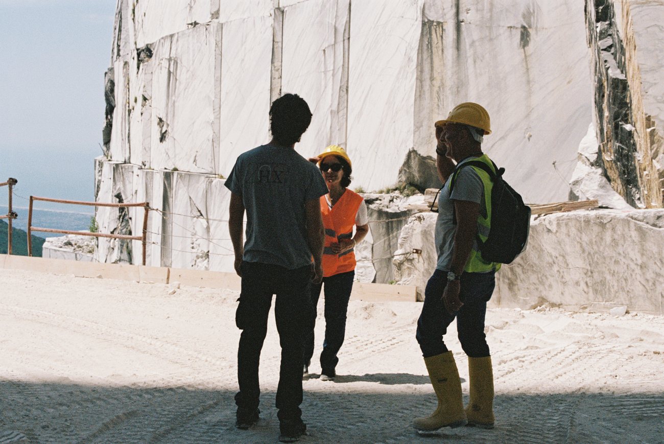 The Roma Marble team walking a working marble quarry in Italy