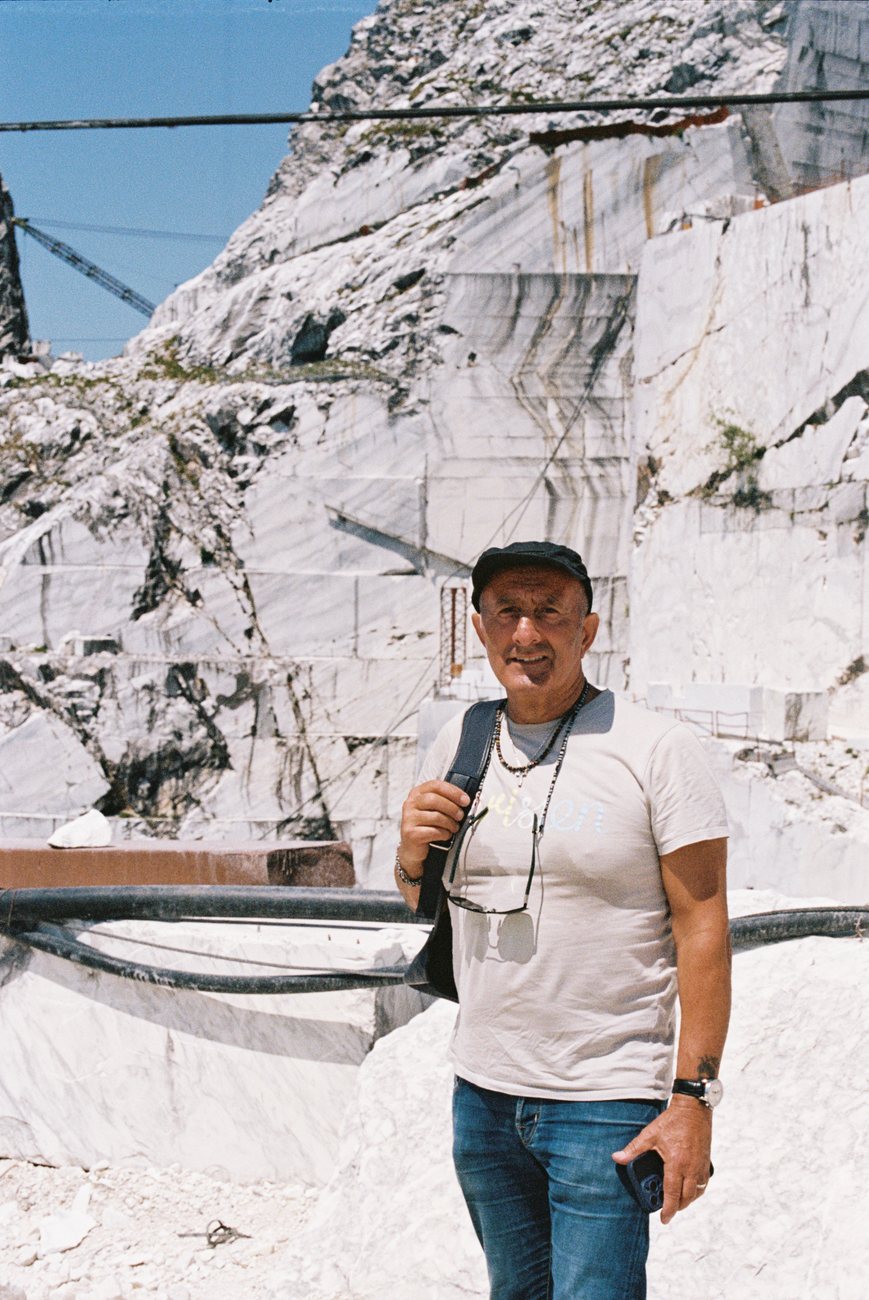 Roma Marble buyer at the marble quarry face in Italy