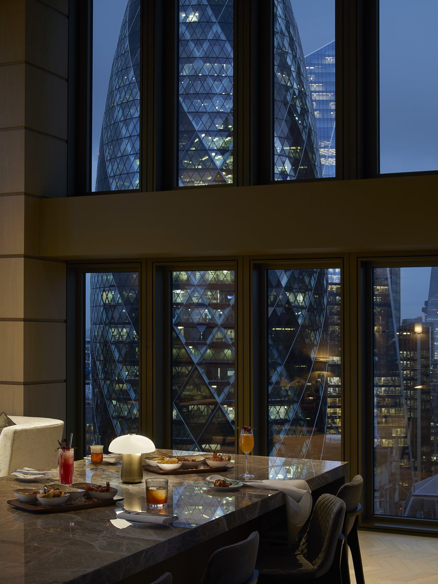 The penthouse kitchen island was crafted from Bardiglio marble — Bishopsgate, Roma Marble