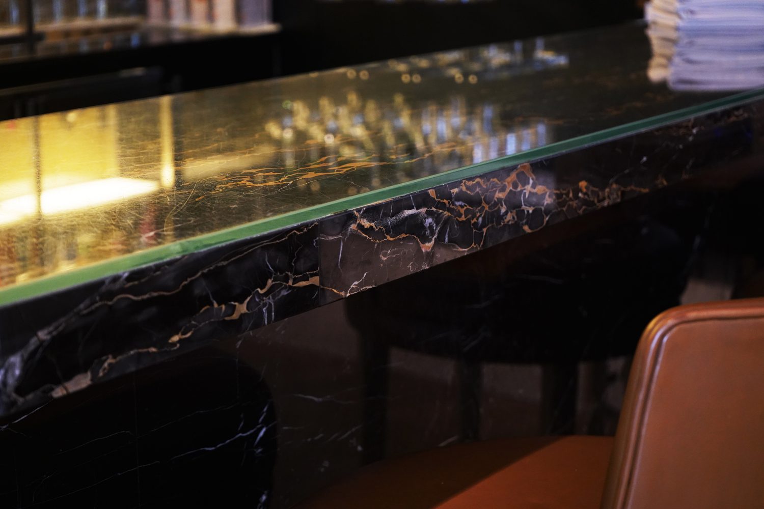 Detail of the Portoro Gold marble bar top, Blakemore Hyde Park - Roma Marble