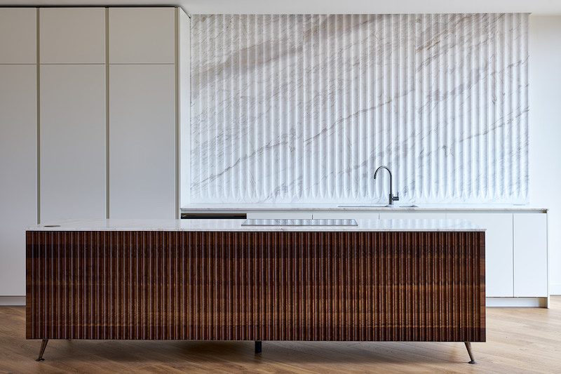 Roma Quartz worktops and splashbacks finished with an apex edge detail — Television Centre, Roma Marble