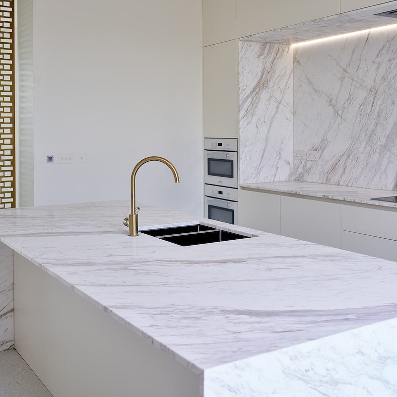 Kitchens clad in Volakas Fluted Finish marble wall panelling, sourced direct from Greece — Television Centre, Roma Marble