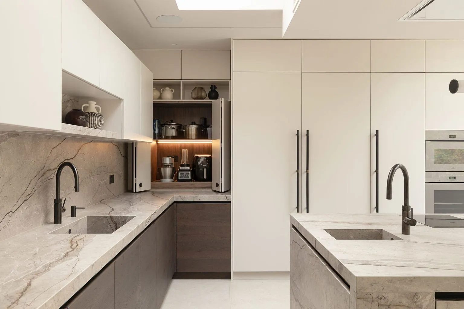 The Marazzi Porcelain was chosen for its visual austerity — Highgate, Roma Marble