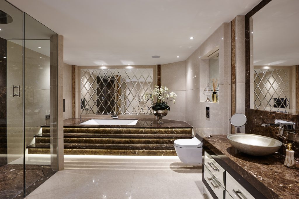 An indoor pool finished in Travertine, Sivec and Carrara marble — Cloak House, Roma Marble