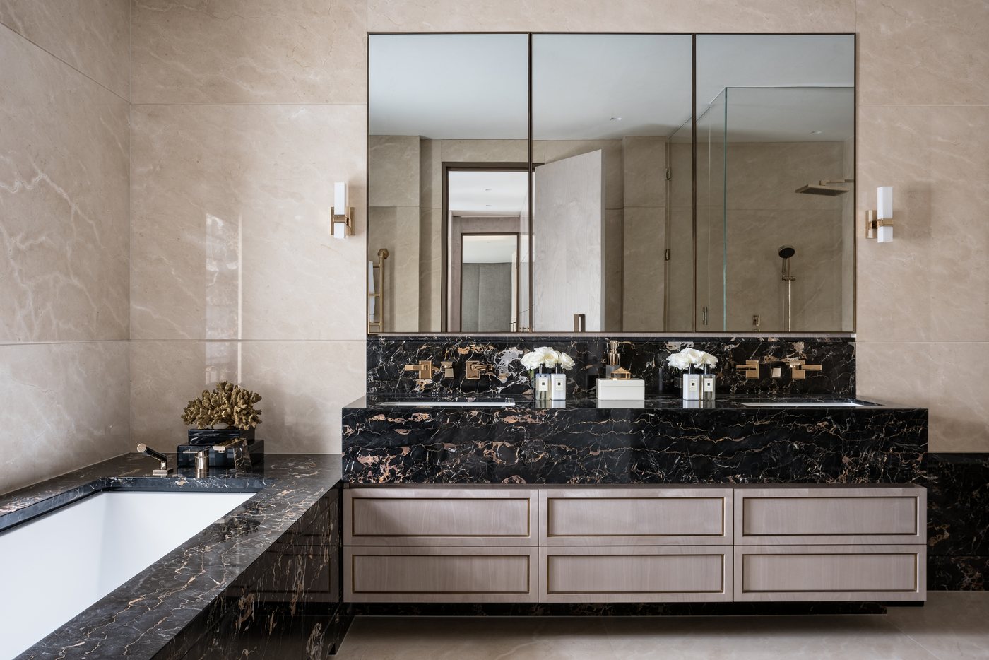 The master bathroom pairs the dramatic depth of Portoro Gold marble — Winnington Road, Roma Marble
