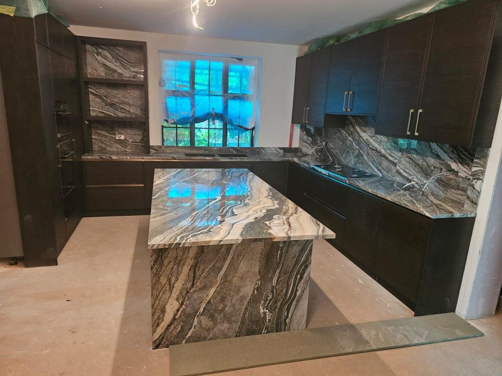 Roma Marble recently completed a striking kitchen installation in Hampstead, featuring the bold and contemporary Infinity Royal Peacock porcelain.